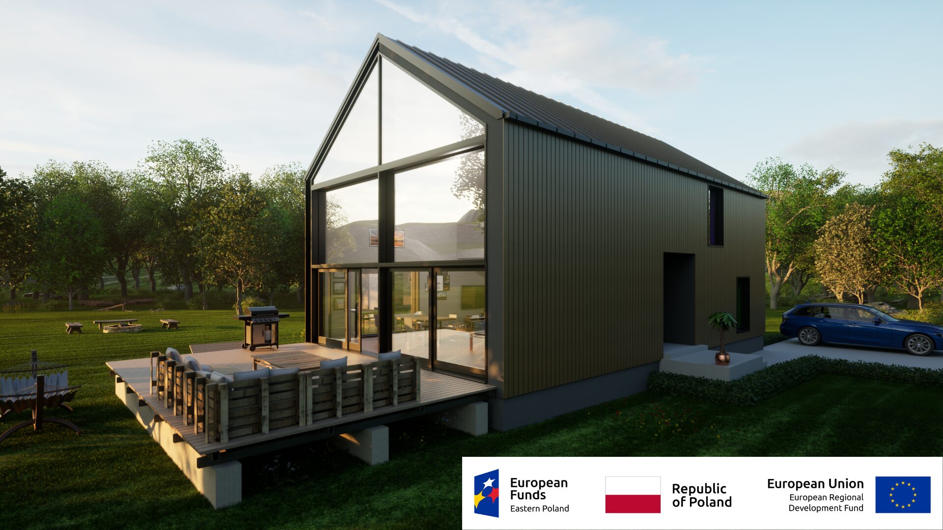 Nowoczesny dom z dużymi przeszkleniami w otoczeniu zieleni, wspierany przez fundusze UE i Polski, położony na przestronnym tarasie.